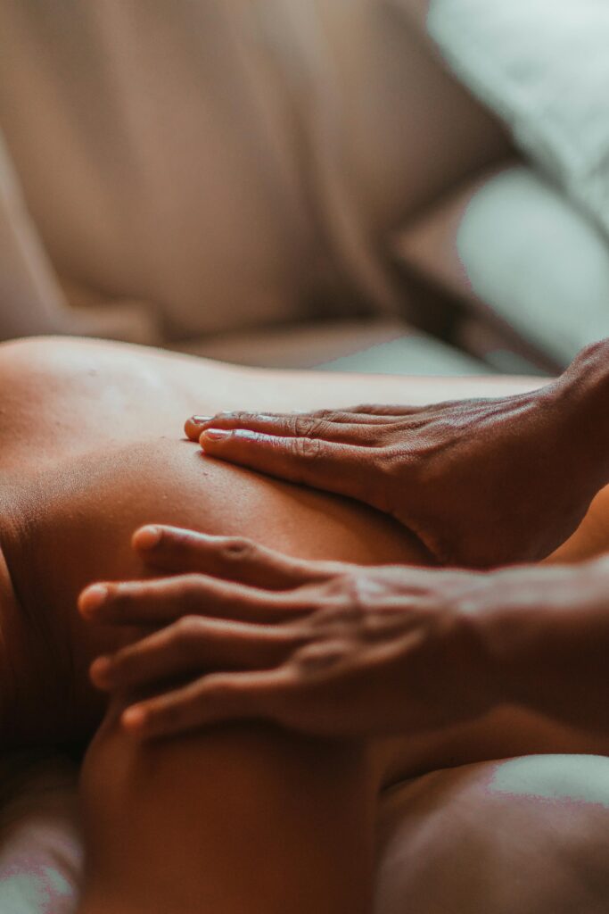 A soothing back massage session in a spa setting, focusing on wellness and relaxation.